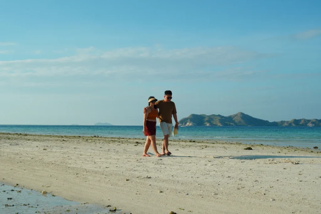 Labuan Bajo, Couple Walking at Beach